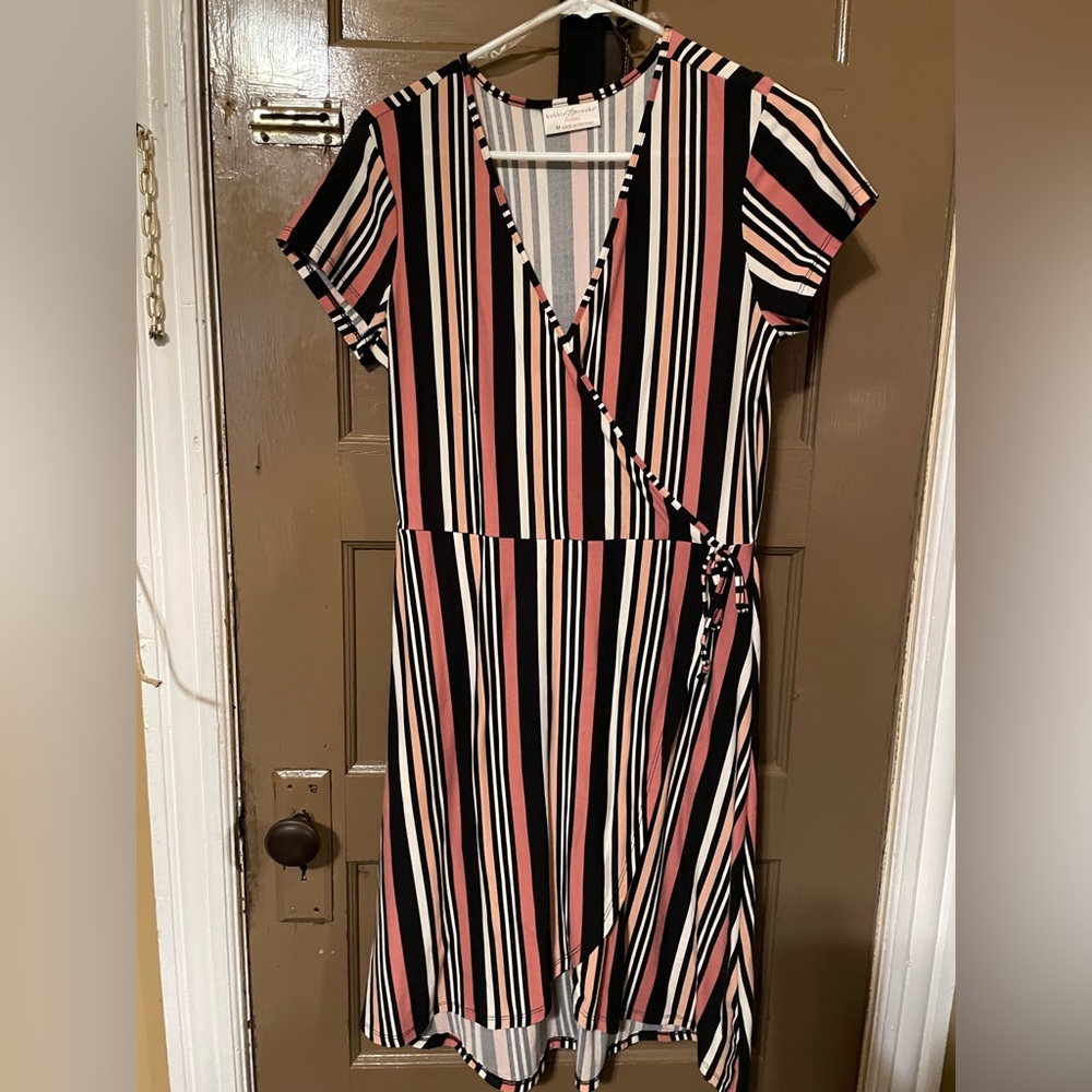 M dress used once no tear or rips